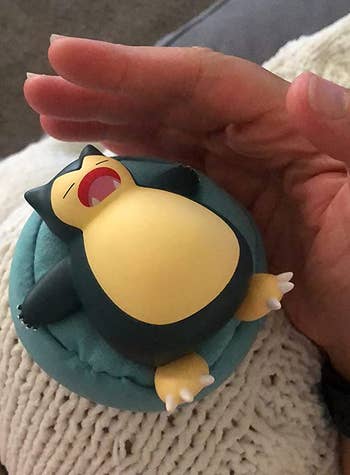 A reviewer's snorlax version that's about the size of their hand