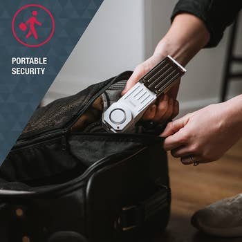 Model putting the doorstop into a bag