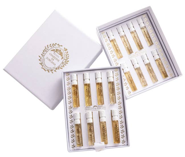 Box of perfume samples with 10 vials. Packaging shows floral plan and