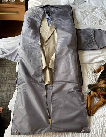 another reviewer showing inside of garment bag holding a suit 