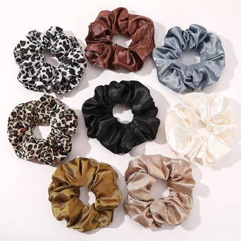 eight satin scrunchies in assorted colors and prints