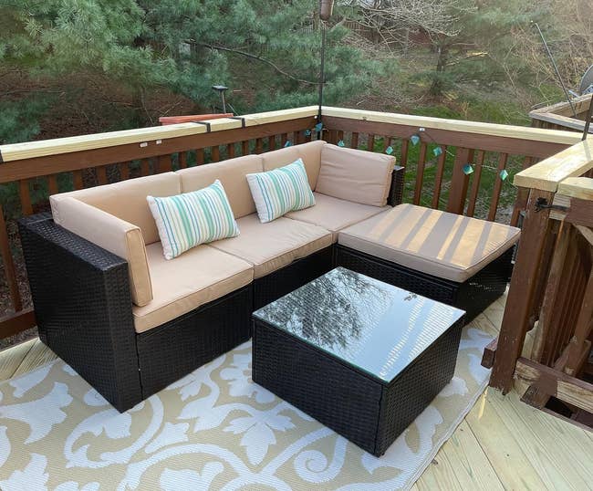 reviewer's outdoor sectional sofa with glass-top table