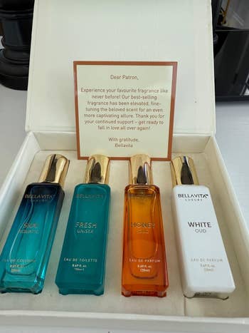 Four Bellavita fragrance bottles successful a box. Note acknowledgment patrons for enactment and introduces updated scents