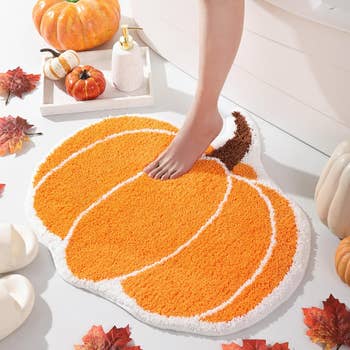 a pumpkin bath mat