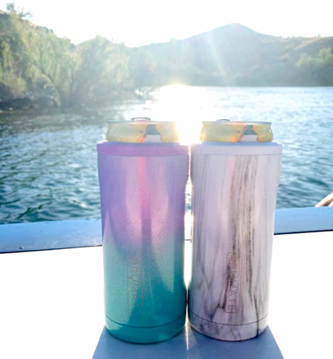reviewer image of two slim cans in different patterned koozies