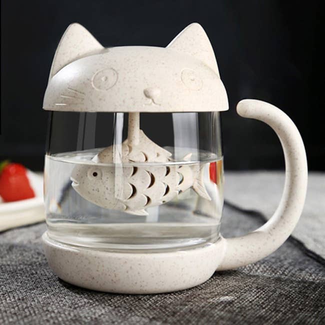 white Cat-shaped tea mug with built-in infuser shaped like a fish 