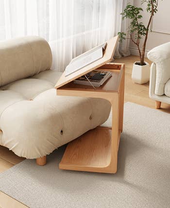 Adjustable woody  broadside  array  with unfastened  book, featuring a modern   Z-shape plan  beside a cozy sofa successful  a bright, airy surviving  room