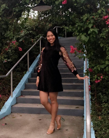 different reviewer in the dress with clear heels