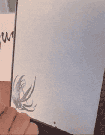 Person sketching an abstract plan connected a tablet with a stylus pen
