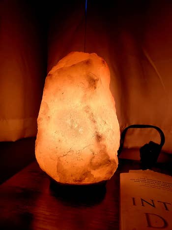 reviewer photo of a lit rock salt lamp