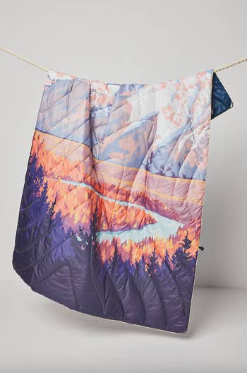puffy blanket with a Teton design