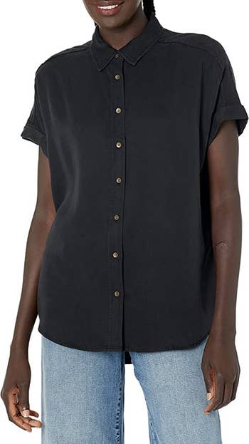 Reviewer wearing the short sleeve button down in black