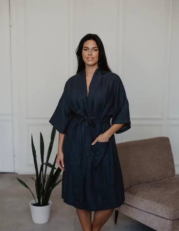 Model wearing the charcoal robe