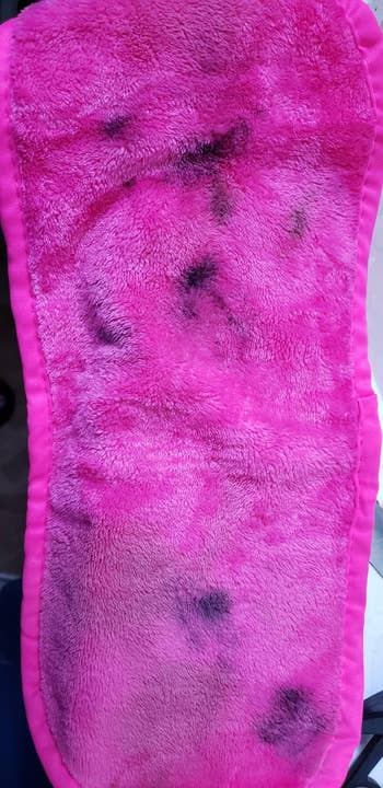 pink cloth with dark makeup on it