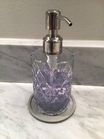 a diamond cut glass soap dispenser
a diamond cut glass soap dispenser
