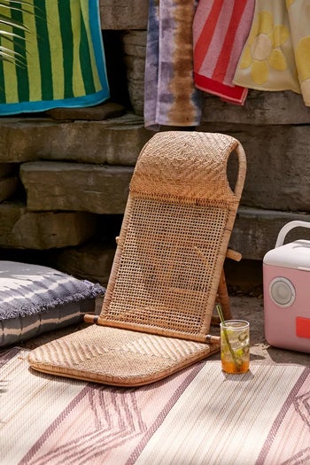 the woven rattan beach chair on a patio