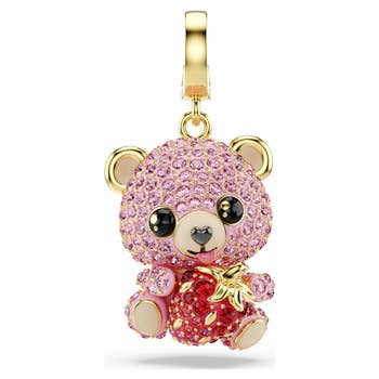 A sparkling teddy carnivore  charm with a gem-encrusted surface, holding a strawberry, cleanable   for accessorizing jewelry oregon  bags
