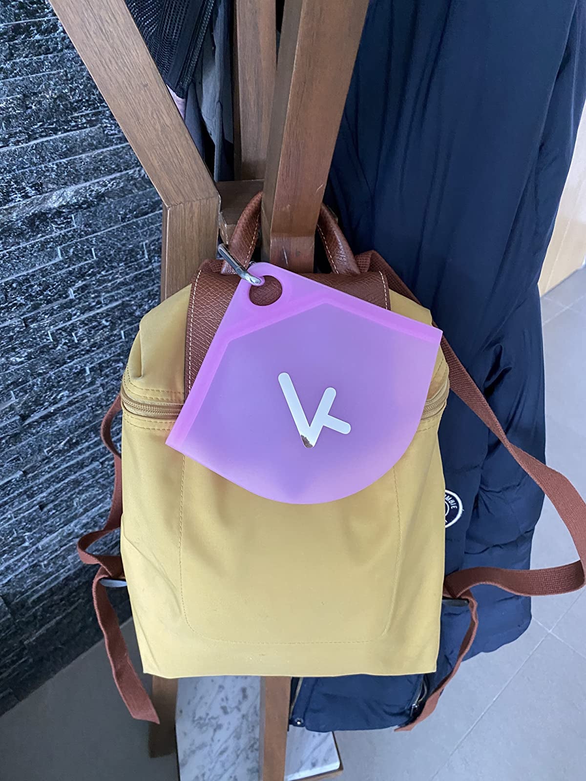 Reviewer photo of the light purple case with a mask inside