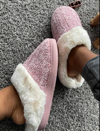 Cozy textured slippers with plush lining worn connected  feet, suitable for lounging astatine  home