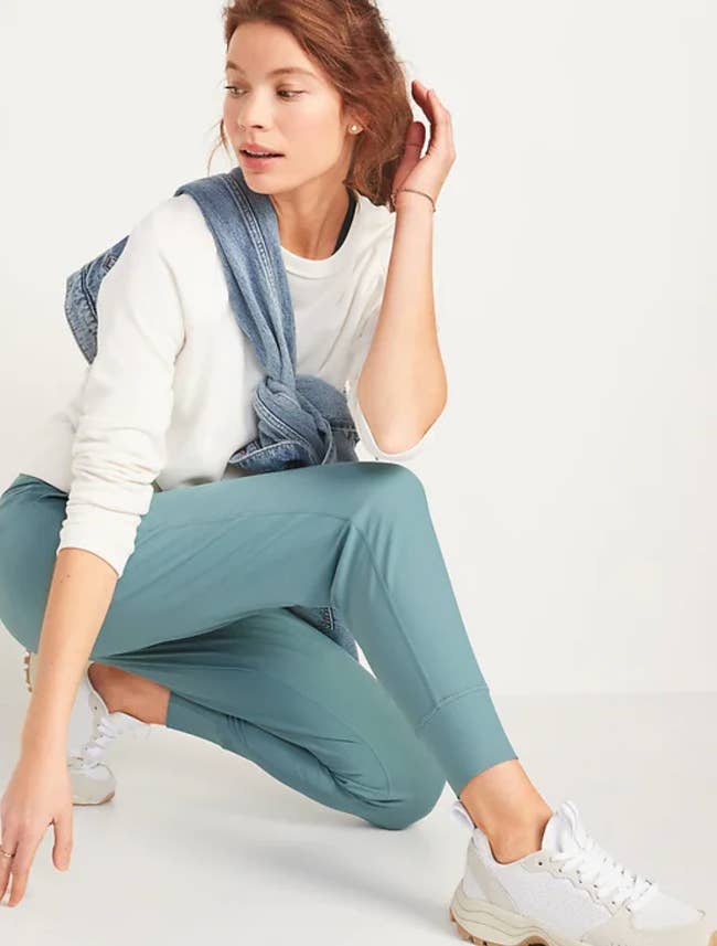 Model in a pair of light blue joggers 