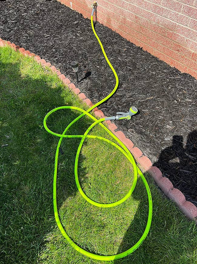 a reviewer's lime green garden hose