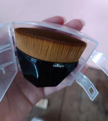 reviewers small round fine bristled makeup brush in a case