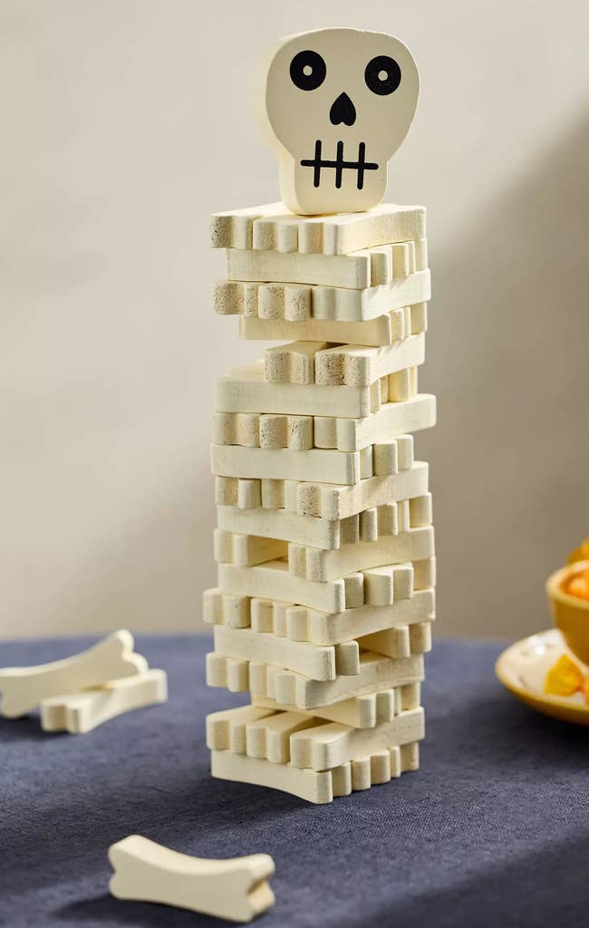 Stack of bone-shaped blocks topped with a skull figure