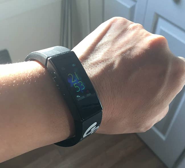 A customer review photo of them wearing the tracker in black