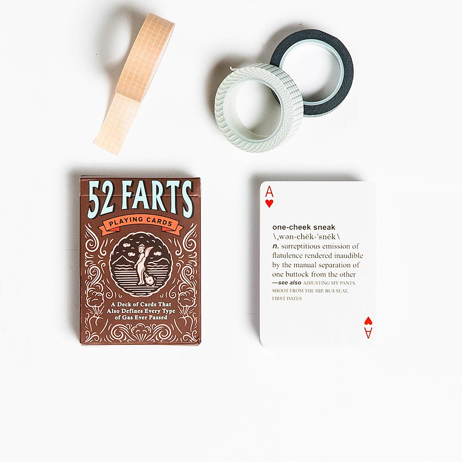 a pack of cards that say 52 farts next to a card that says one cheek sneak