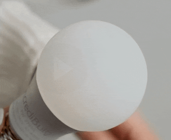 GIF of model squeezing it 