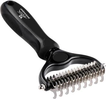 a double sided groomer brush