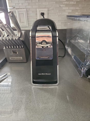 reviewer's can opener on counter