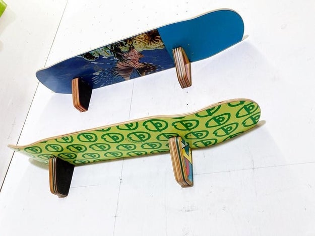a blue board and green board mounted as shelves