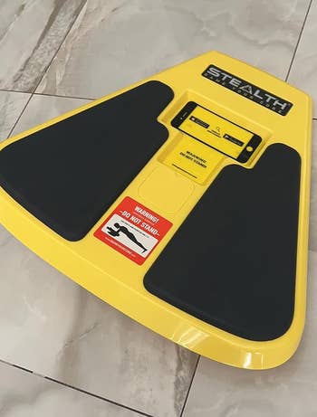 a reviewer photo of the core trainer in yellow 