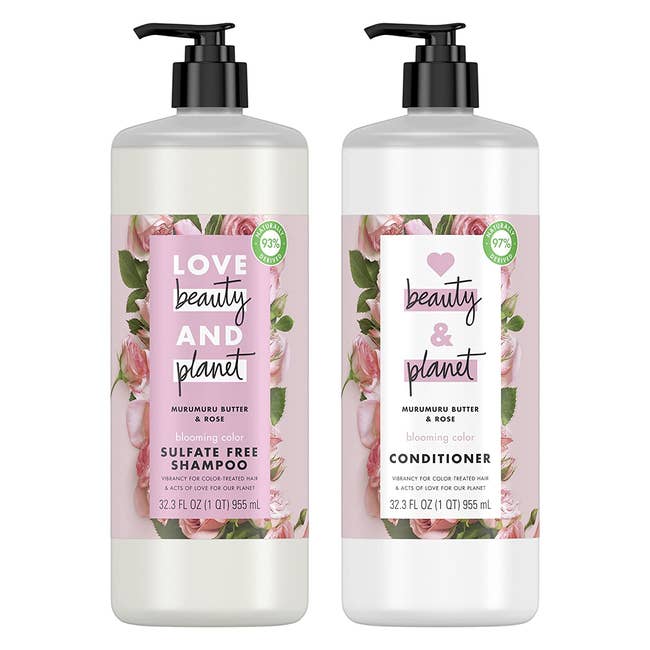 White and rose colored shampoo and conditioner bottles with pumps on a white background