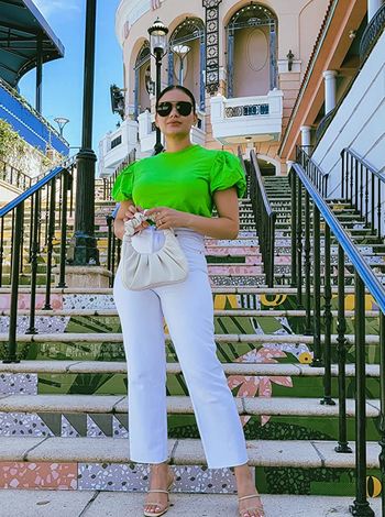 another reviewer holding the cream version