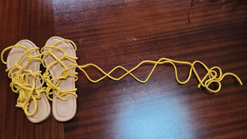 Reviewer image of product in yellow on hardwood floor with ties undone