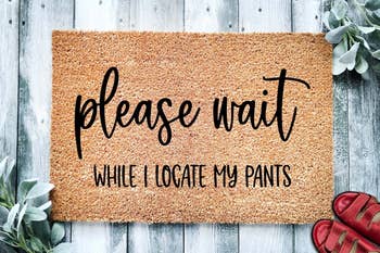 mat that says please wait while I locate my pants