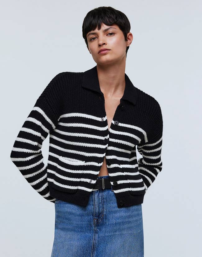 model wearing the black and white striped cardigan