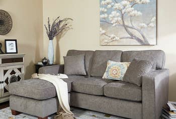 lifestyle photo of a gray fabric sectional sofa
