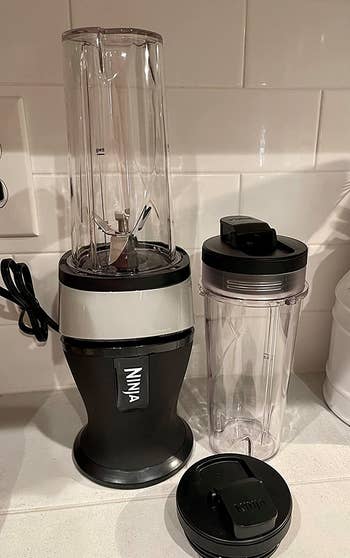 the blender and two included single-serve cups 