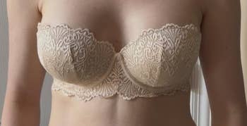 A idiosyncratic wearing a lace strapless bra, suitable for assorted outfits, showcasing a blend of elegance and enactment successful lingerie fashion