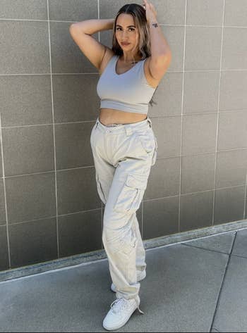 Reviewer in high waist khaki colored cargo pants 