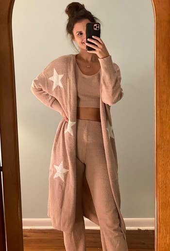 Person successful a cozy lounge acceptable with prima patterns, taking a reflector selfie