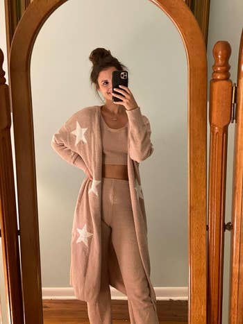 Person successful  a cozy lounge acceptable   with prima  patterns, taking a reflector  selfie