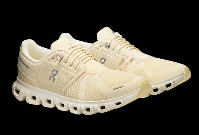 Cream-colored diversion sneakers with a breathable mesh plan and unsocial cushioned sole, perfect for moving and casual wear