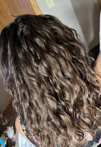 reviewer from behind showing wavy hair