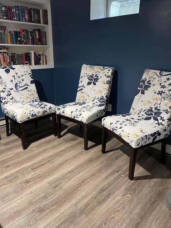 reviewer's dining room chairs with blue and white floral cover