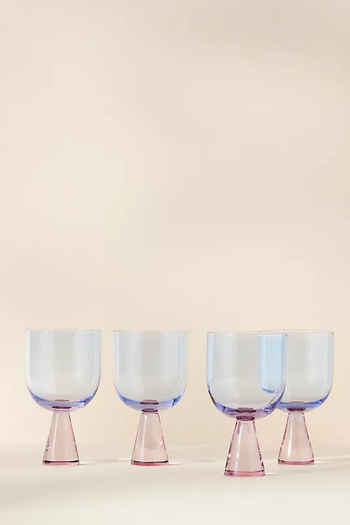 a four set of blue and purple glasses