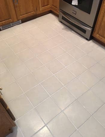 the same tile floor now looking clean after using the grout pen